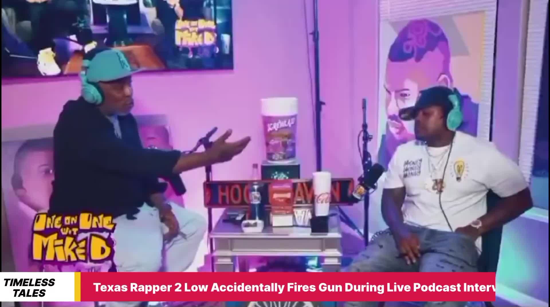 texas-rapper-2-low-accidentally-fires-gun-during-live-podcast-interview-1736137402.mp4