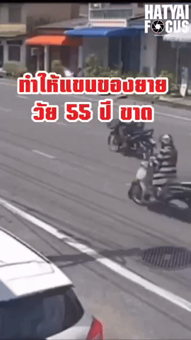 giphy-4-woman-in-thailand-loses-hand-after-shirt-gets-caught-in-motorcycle-s-wheel-causing-her-to-fall-off-1742356765.gif