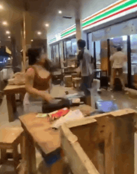 drunk-youths-brawl-2-drunk-youths-brawl-throw-chairs-tables-outside-7-eleven-in-philippines-1752737407.gif