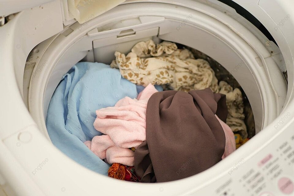 pngtree-clothing-items-viewed-up-close-inside-a-laundry-machine-photo-image48995984-17274293779931242427206-1727599500719-1727599500814889754852-1790961440.webp