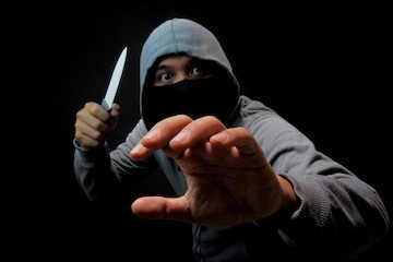 man-mask-holding-knife-dark-viol-1741163111.jpg