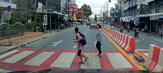 motorcyclist-thailand-zebra-crossing-1-motorcyclist-in-thailand-sends-boy-flying-after-failing-to-give-way-at-zebra-crossing-1744598424.gif