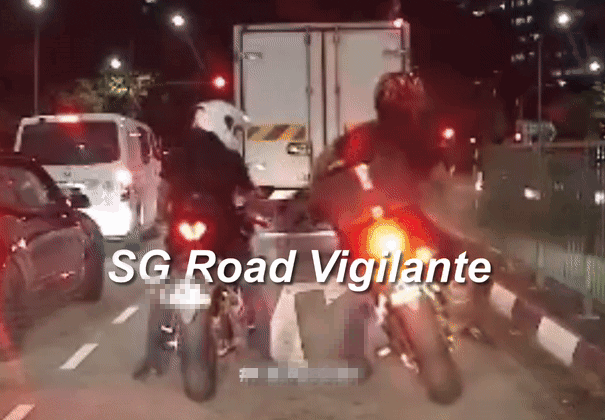 stretching-fall-gif-3-s-pore-motorcyclist-falls-on-top-of-another-rider-after-doing-stretches-at-traffic-light-1750390372.gif