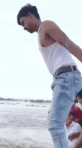 ezgif-8c91feaa33cc6e-19-year-old-jumps-into-river-in-india-for-s-7-bet-swept-away-by-strong-currents-1757305069.gif