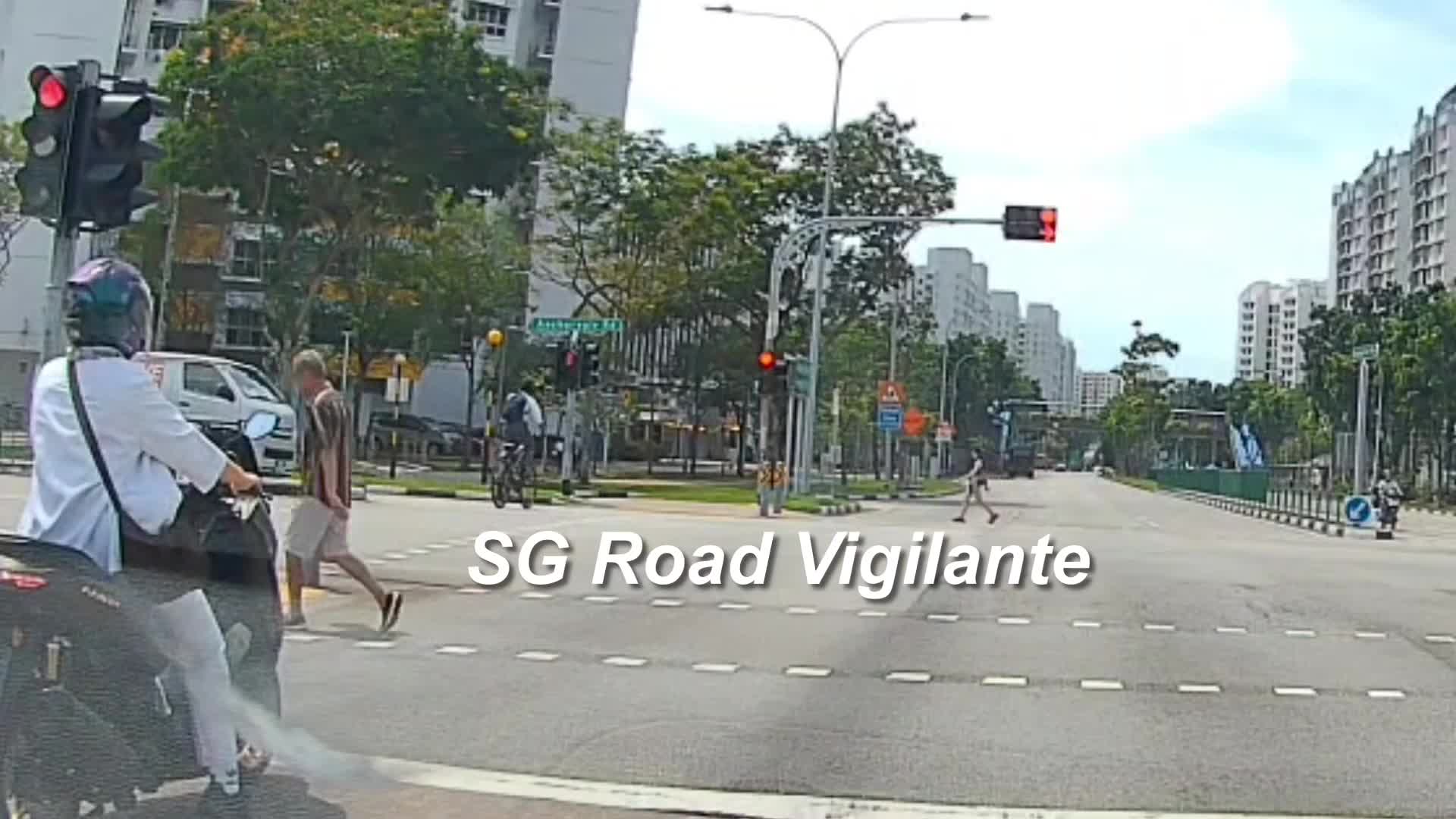 24may2025-1227hrs-junction-between-anchorvale-road-sengkang-east-way-cyclist-failing-to-conform-to-red-light-signal-get-hit-by-food-delivery-motorcyclist-quoted-there-was-an-ambulance-right-behind-my-car-and-the-am-1748399569.mp4