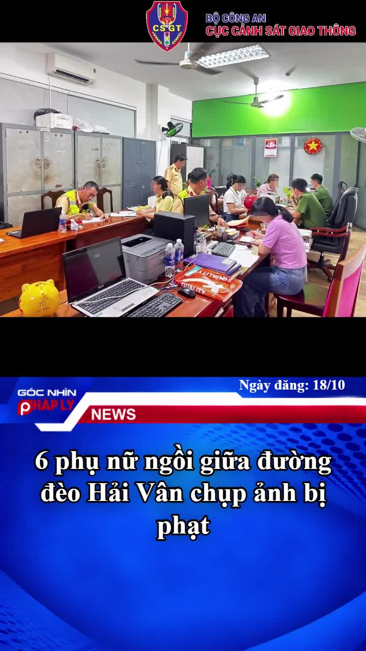 6-phu-nu-ngoi-giua-duong-deo-hai-van-chup-anh-bi-phat-1-1792317874.mp4