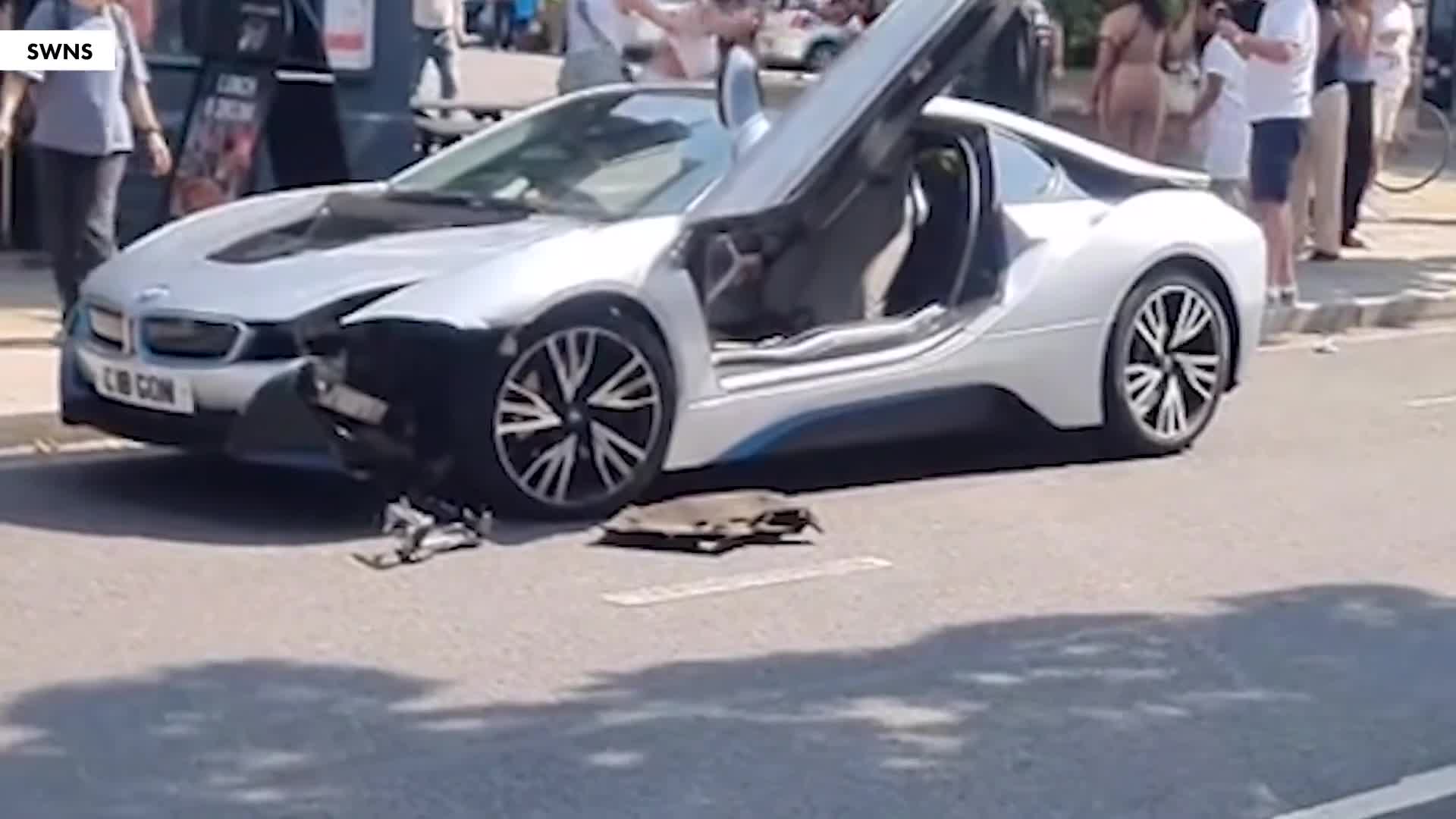 bmw-passenger-wrestles-with-passersby-after-crash-on-london-street-1752824764.mp4