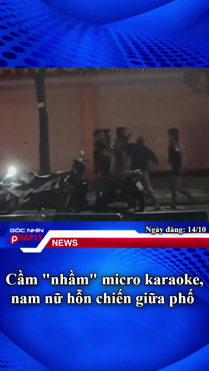 cam-nham-micro-karaoke-nam-nu-hon-chien-giua-pho-1-1791967564.mp4