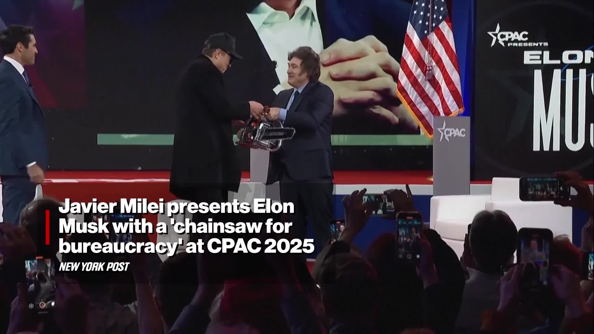 javier-milei-presents-elon-musk-with-a-chainsaw-for-bureaucracy-at-cpac-2025-video-new-york-post-1740217821.mp4