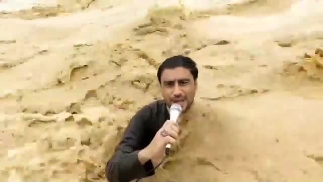 phong-vien-pakistan-bi-nuoc-lu-cuon-troi-khi-dang-truyen-hinh-truc-tiep-video-rohi-tv-1753089458.mp4