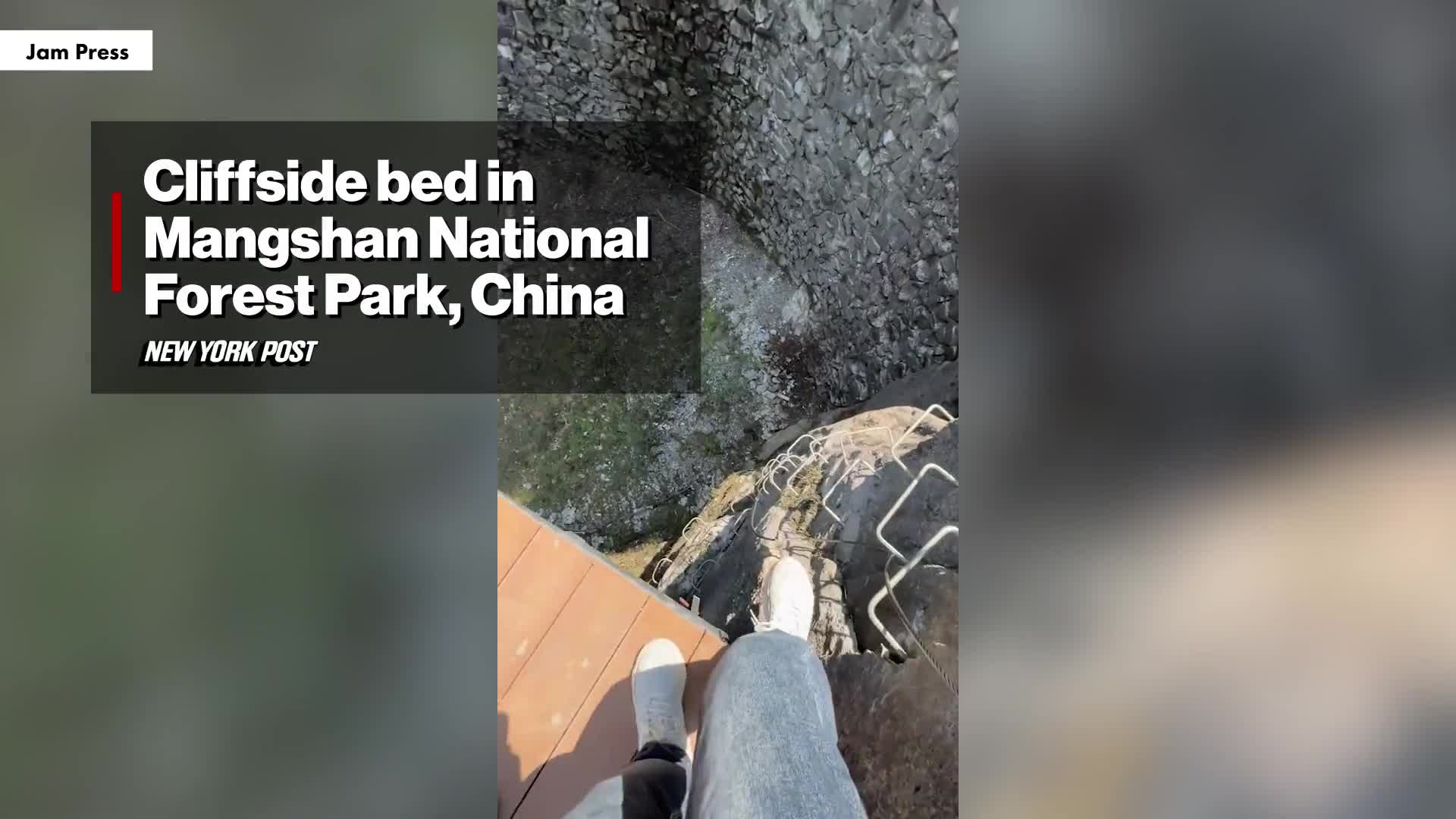 terrifying-attraction-lets-tourists-sleep-while-suspended-over-320-foot-cliff-1747472198.mp4