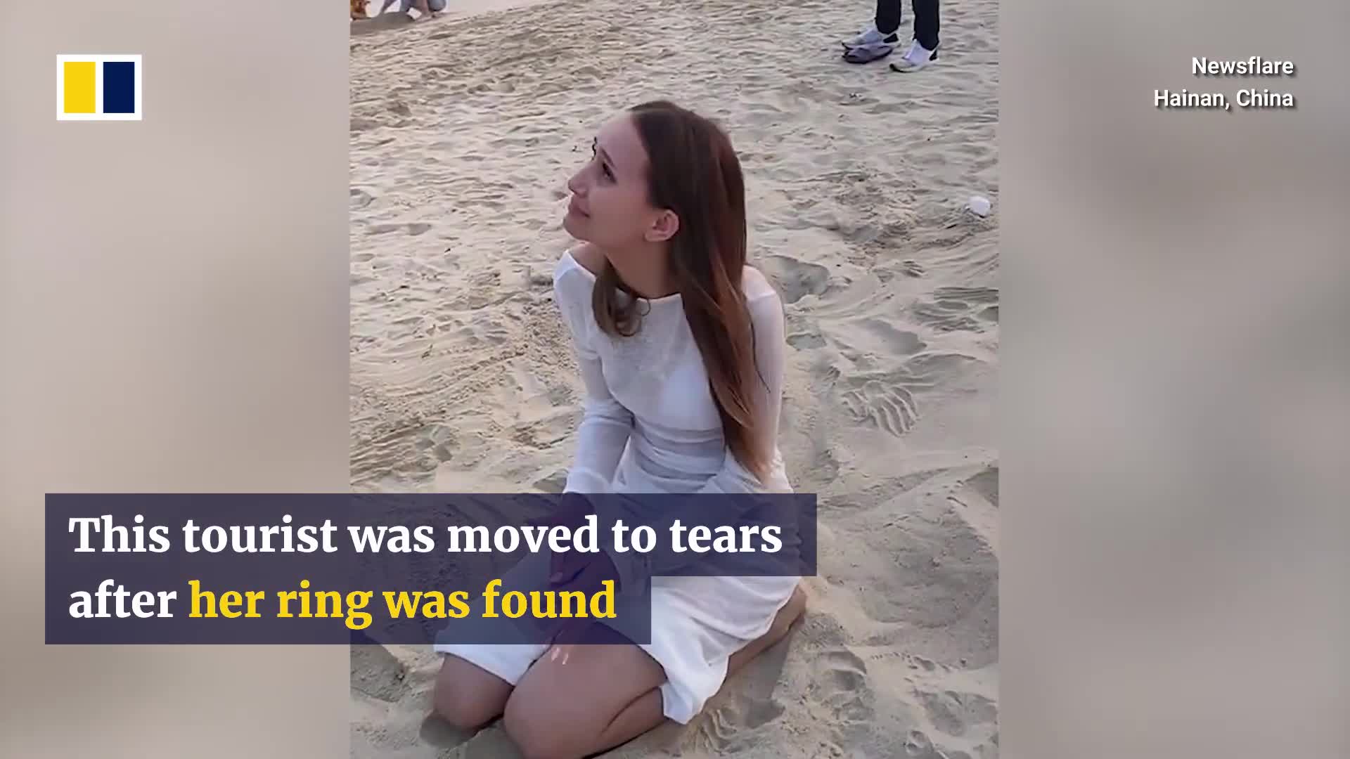 tourist-moved-to-tears-after-locals-find-her-lost-ring-on-chinese-beach-1744865022.mp4