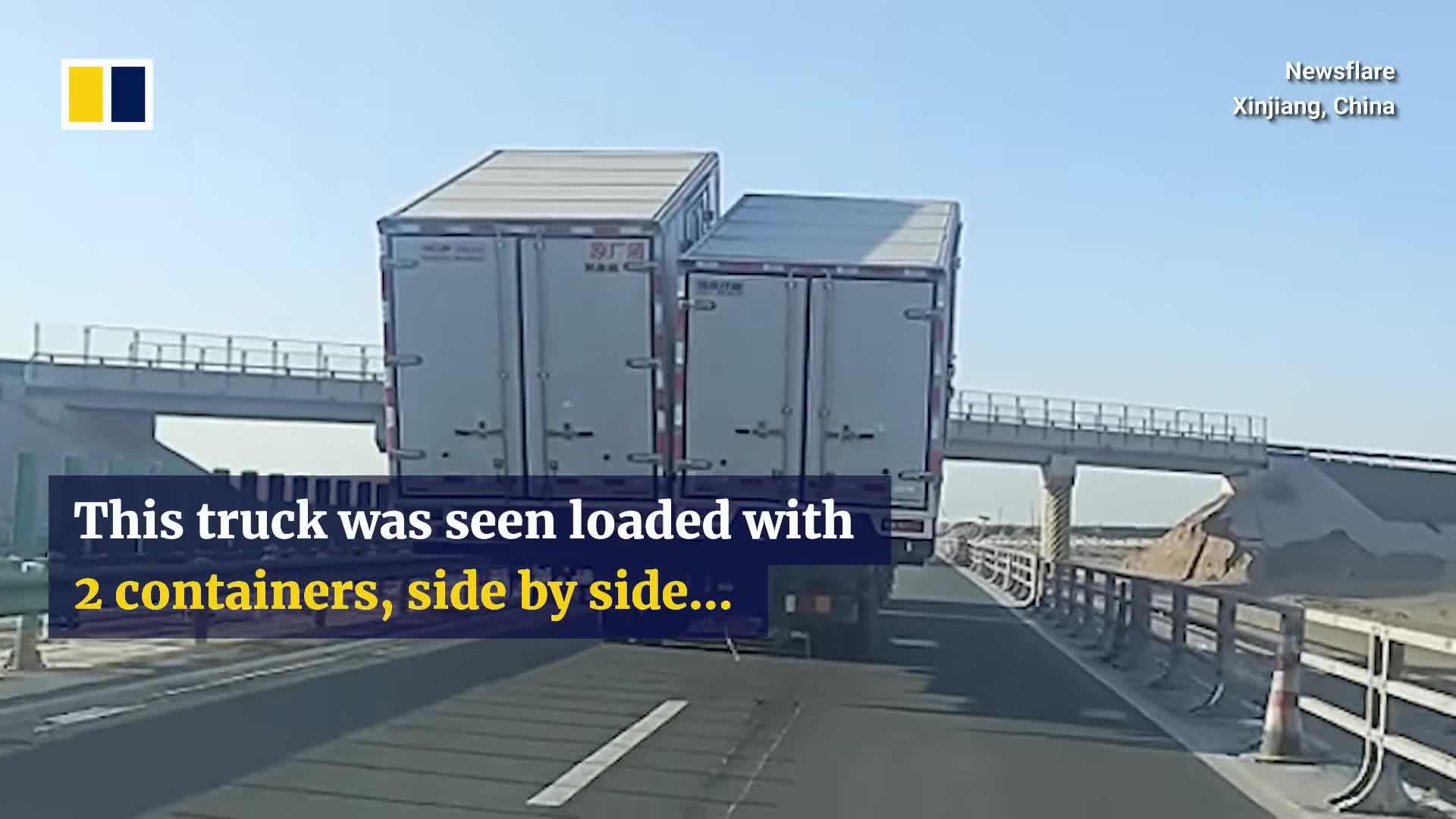 truck-in-china-carries-2-containers-side-by-side-blocking-traffic-on-highway-1741791896.mp4
