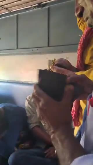 video-man-carrying-snake-asks-for-money-from-train-passengers-railways-responds-1758603986.mp4