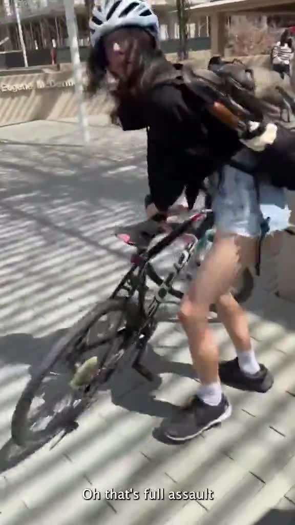 wild-moment-trans-activist-attacks-young-female-student-with-bike-lock-daily-mail-1743148204.mp4