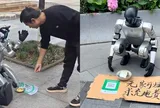 "Robot ăn xin" quỳ giữa phố với tấm biển "xin trả tiền điện", còn nhận chuyển khoản qua mã QR khiến dân mạng tranh cãi dữ dội