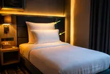 Tại sao các khách sạn luôn để 2 gối trên một giường đơn?