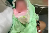 Phát hiện bé trai sơ sinh bị bỏ rơi ở sân nhà máy xát thóc
