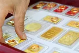 Giá vàng hôm nay 5/10: SJC giữ mốc 143,5 triệu đồng/lượng, vàng thế giới nhích tăng