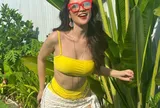 Mỹ nhân Gia Lai diện bikini hồng đào khoe dáng "đồng hồ cát", phong cách ngày càng táo bạo