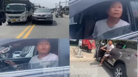 Clip: Tài xế ô tô vi phạm luật giao thông, hung hăng thượng cẳng chân hạ cẳng tay với người ghi hình