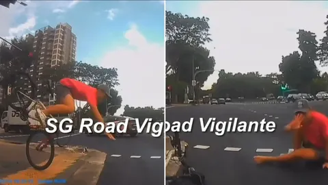 Clip: Người đi xe đạp giật mình phanh gấp, ngã nhào trước mũi ô tô