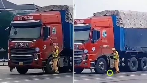 Clip: Sự thật thông tin tài xế xe tải "chỉ tay", "ném" chai nước vào người CSGT