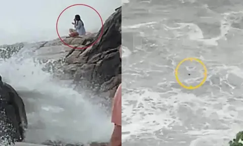 Clip: Cô gái bất ngờ bị sóng "nuốt gọn" khi ngồi thiền trên vách đá