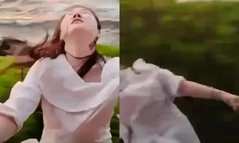 Clip: Thò ra ngoài cửa sổ chụp ảnh, người phụ nữ mắc vào cành cây bị kéo ra khỏi tàu đang chạy nhanh