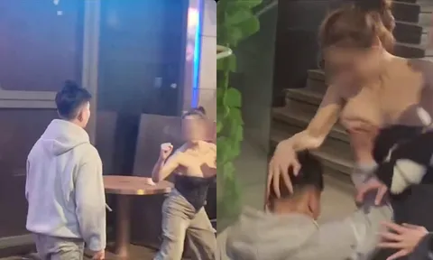 Clip: Đôi nam nữ "giao lưu võ thuật" trên phố, chàng trai thẳng tay lột phăng áo cô gái