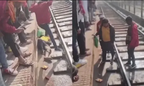 Clip: Giây phút rụng tim chứng kiến cảnh người đàn ông ngã xuống đường ray khi tàu hỏa đi qua