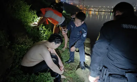 Dũng cảm giữa dòng nước xiết: Nam thanh niên lao xuống sông cứu người trong đêm tới