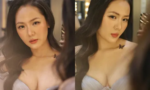Khó rời mắt trước vẻ đẹp gợi cảm của Phương Linh khi diện váy khoe vòng một hững hờ, thần thái cuốn hút