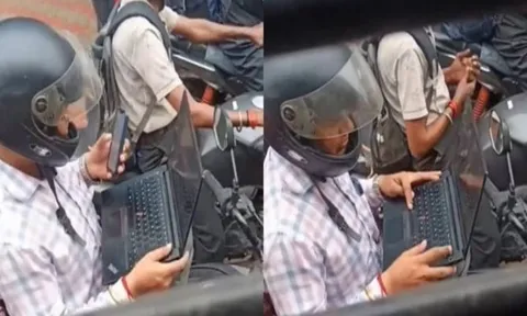 Giữa dòng xe ùn tắc giờ tan tầm, người đàn ông tranh thủ mở laptop, cắm cúi làm việc khi chờ đèn đỏ khiến nhiều người xót xa: Dân mạng phẫn nộ khi nhìn ra sự thật phía sau