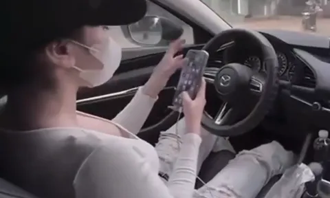 Sự thật bất ngờ về clip cô gái vô tư buông vô lăng để bấm điện thoại khi lái ô tô