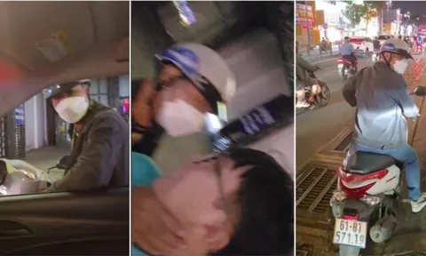 Tài xế taxi bị người đàn ông đi xe máy bóp cổ, đạp ngã giữa đường ở TP.HCM, công an vào cuộc