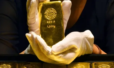 Giá vàng châu Á hạ nhiệt sau khi lập đỉnh