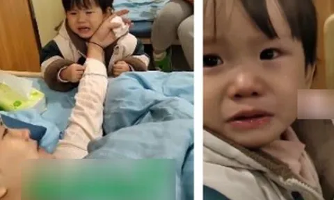 Bé gái 2 tuổi khóc suốt 40 phút khi thấy mẹ đau vì sinh em, hôn lên mặt mẹ rồi nói 1 câu khiến cả phòng nghẹn ngào