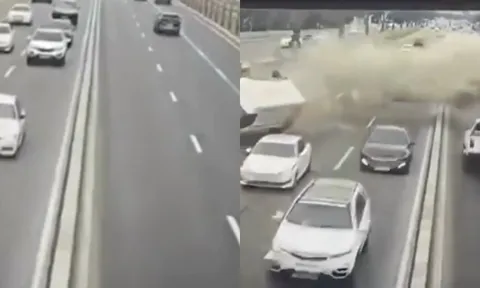 Hãi hùng clip ô tô mất lái lao qua rào chắn, rơi xuống đường vào giờ cao điểm