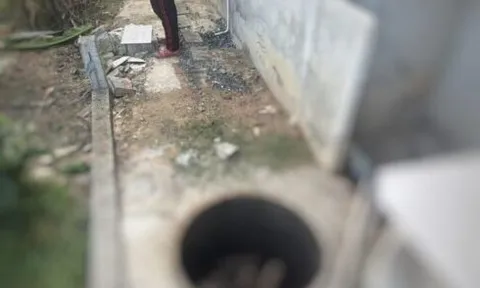 Phát hiện thi thể người phụ nữ dưới bể phốt, hiện trường thương tâm