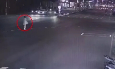 Clip: Thiếu nữ 19 tuổi nhảy múa giữa đường như mất kiểm soát trong đêm, khiến cả phố náo loạn