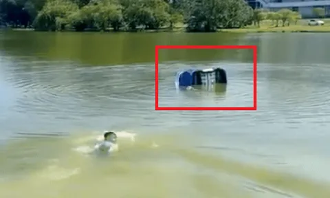 Mẹ chở con gái trên ô tô lao xuống hồ nước, nhân chứng bơi tới thấy điều đau xót