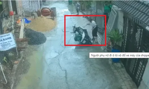 Hé lộ người phụ nữ xuống ô tô xô đổ xe máy của shipper: Ăn mặc rất lịch sự, đi cùng 1 nam giới