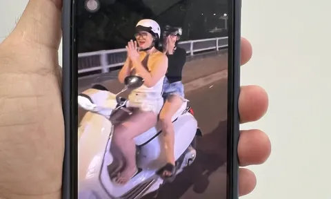 Công an vào cuộc vụ cô gái đi xe Vespa buông hai tay vái lạy người khác ở TPHCM