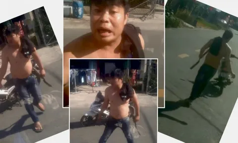 Người đàn ông lăm lăm hung khí, bất ngờ đập phá xe tải giữa đường gây náo loạn