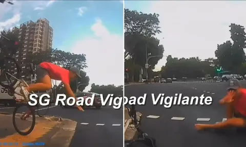 Clip: Người đi xe đạp giật mình phanh gấp, ngã nhào trước mũi ô tô