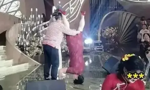 Clip: Mẹ chú rể biểu diễn màn “trồng chuối” ngay trên sân khấu, khách mời và cô dâu "đứng hình"