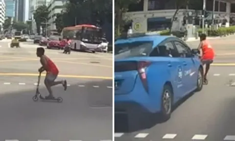 Camera ghi lại khoảnh khắc bé trai 9 tuổi bị taxi hất văng giữa ngã tư, lý do khiến nhiều người vừa thương vừa giận