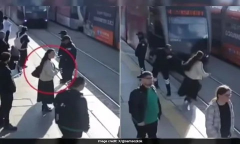 Video ghi lại cảnh bảo vệ lao đến, giữ lại người phụ nữ giúp cô thoát chết trước mũi tàu điện