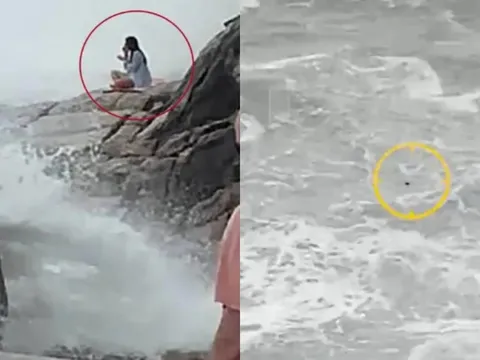 Clip: Cô gái bất ngờ bị sóng "nuốt gọn" khi ngồi thiền trên vách đá